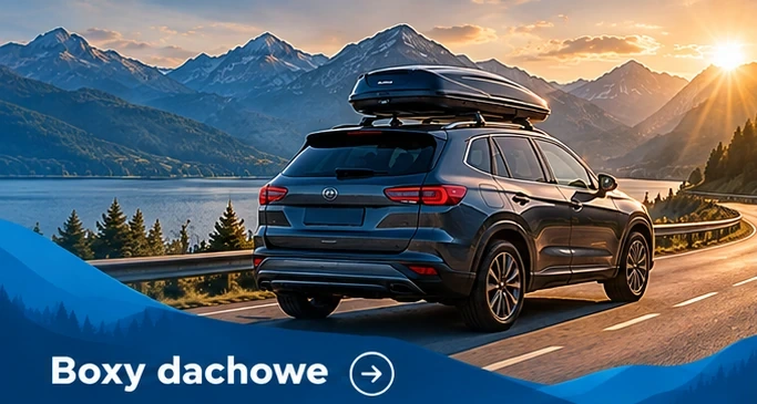 Boxy dachowe — granatowe auto na górskiej drodze z odpowiednim wyposażeniem